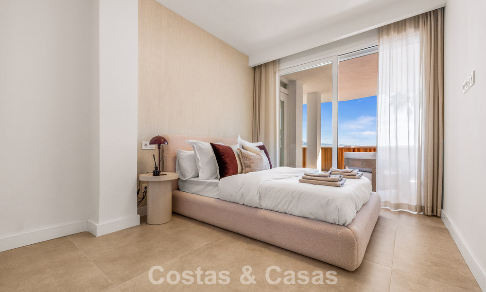 Modern renovated apartment with spacious terrace for sale with panoramic views in Nueva Andalucía, Marbella 796063