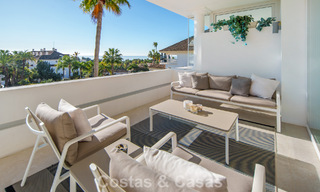 Exclusive duplex penthouse with a modern and light interior for sale in a gated complex on the Golden Mile, Marbella 796391 