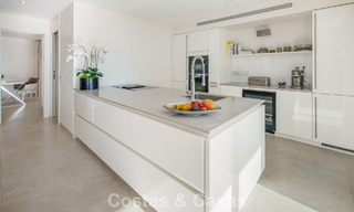 Exclusive duplex penthouse with a modern and light interior for sale in a gated complex on the Golden Mile, Marbella 796392 