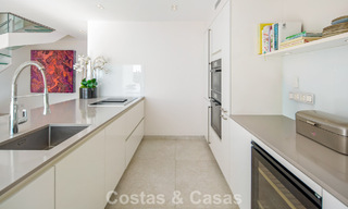 Exclusive duplex penthouse with a modern and light interior for sale in a gated complex on the Golden Mile, Marbella 796395 