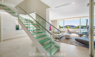 Exclusive duplex penthouse with a modern and light interior for sale in a gated complex on the Golden Mile, Marbella 796398 