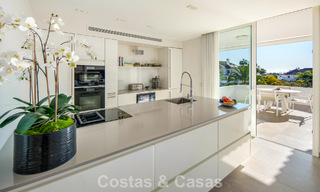 Exclusive duplex penthouse with a modern and light interior for sale in a gated complex on the Golden Mile, Marbella 796404 