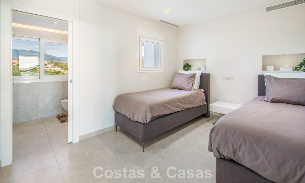 Exclusive duplex penthouse with a modern and light interior for sale in a gated complex on the Golden Mile, Marbella 796405