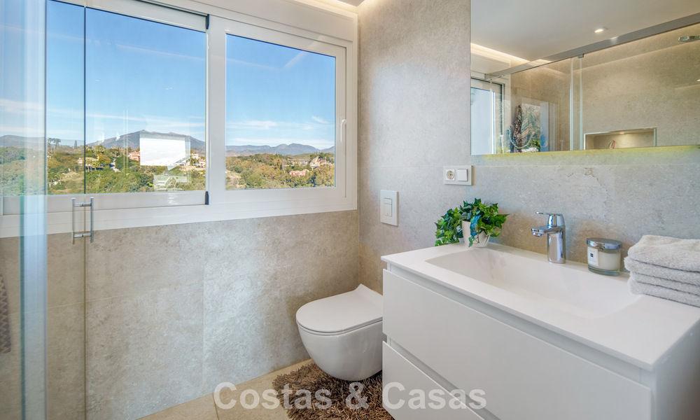 Exclusive duplex penthouse with a modern and light interior for sale in a gated complex on the Golden Mile, Marbella 796406