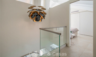 Exclusive duplex penthouse with a modern and light interior for sale in a gated complex on the Golden Mile, Marbella 796409 