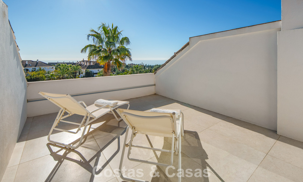 Exclusive duplex penthouse with a modern and light interior for sale in a gated complex on the Golden Mile, Marbella 796414