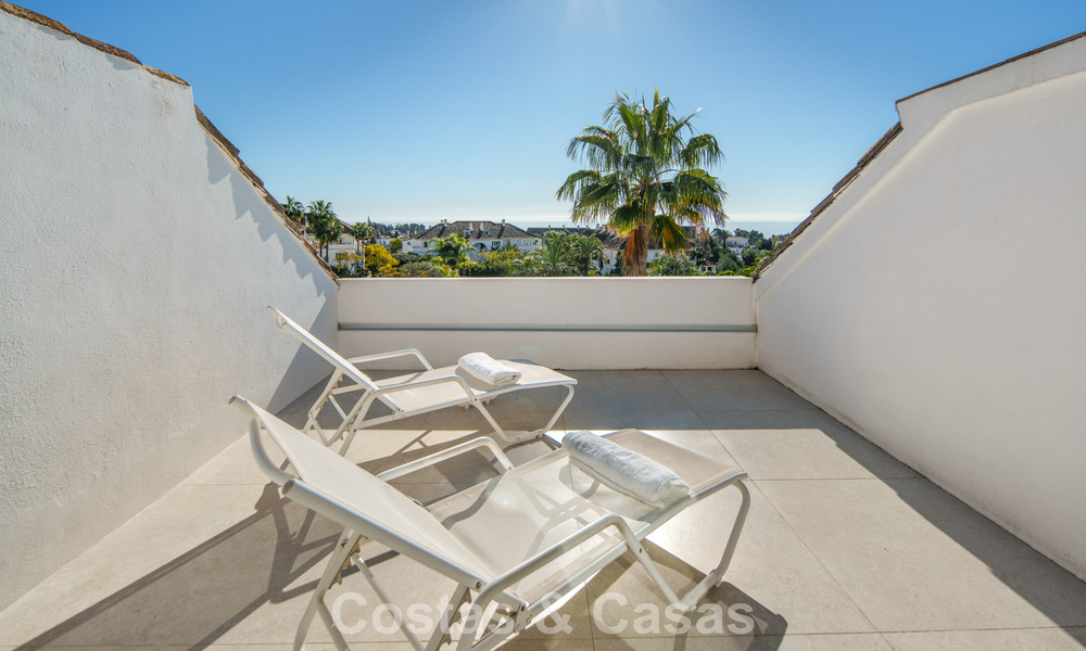 Exclusive duplex penthouse with a modern and light interior for sale in a gated complex on the Golden Mile, Marbella 796415