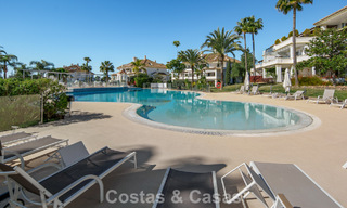 Exclusive duplex penthouse with a modern and light interior for sale in a gated complex on the Golden Mile, Marbella 796421 