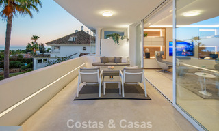 Exclusive duplex penthouse with a modern and light interior for sale in a gated complex on the Golden Mile, Marbella 796426 