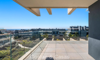 Contemporary penthouse with sea views from the rooftop terrace for sale on the New Golden Mile, between Marbella and Estepona 796605 