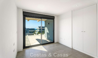 Contemporary penthouse with sea views from the rooftop terrace for sale on the New Golden Mile, between Marbella and Estepona 796614 