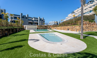 Contemporary penthouse with sea views from the rooftop terrace for sale on the New Golden Mile, between Marbella and Estepona 796627 