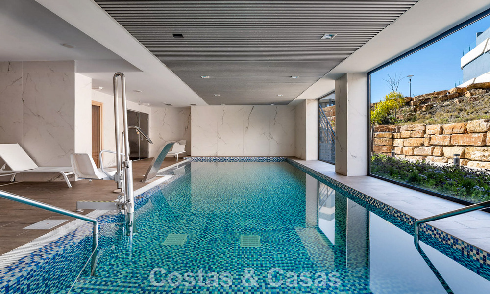 Contemporary penthouse with sea views from the rooftop terrace for sale on the New Golden Mile, between Marbella and Estepona 796630