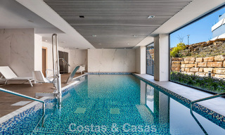 Contemporary penthouse with sea views from the rooftop terrace for sale on the New Golden Mile, between Marbella and Estepona 796630 