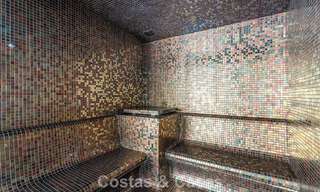 Contemporary penthouse with sea views from the rooftop terrace for sale on the New Golden Mile, between Marbella and Estepona 796632 