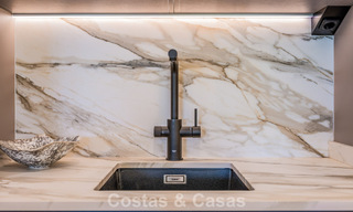 Elegant renovated apartment for sale within walking distance of the beach on the New Golden Mile between Marbella and Estepona 797211 