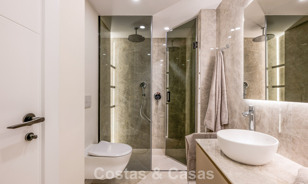 Elegant renovated apartment for sale within walking distance of the beach on the New Golden Mile between Marbella and Estepona 797256