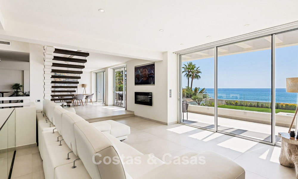 Exclusive, modern beachfront villa for sale with direct access to the beach in Mijas, Costa del Sol 797374