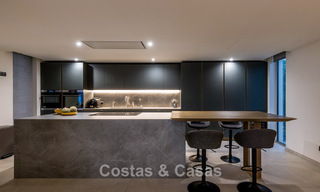 Exclusive, modern beachfront villa for sale with direct access to the beach in Mijas, Costa del Sol 797379 