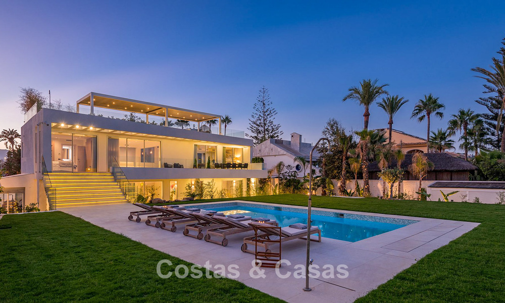 Exclusive, modern beachfront villa for sale with direct access to the beach in Mijas, Costa del Sol 797383