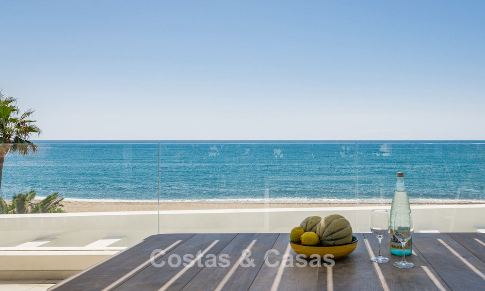 Exclusive, modern beachfront villa for sale with direct access to the beach in Mijas, Costa del Sol 797384