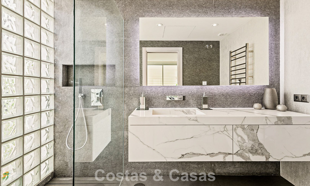 Exclusive, modern beachfront villa for sale with direct access to the beach in Mijas, Costa del Sol 797390