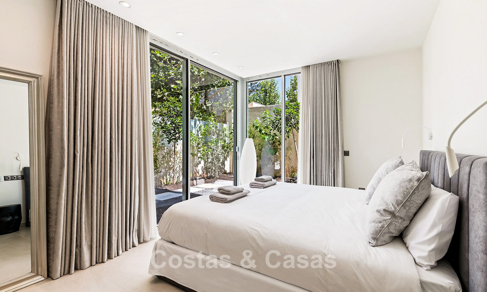 Exclusive, modern beachfront villa for sale with direct access to the beach in Mijas, Costa del Sol 797392
