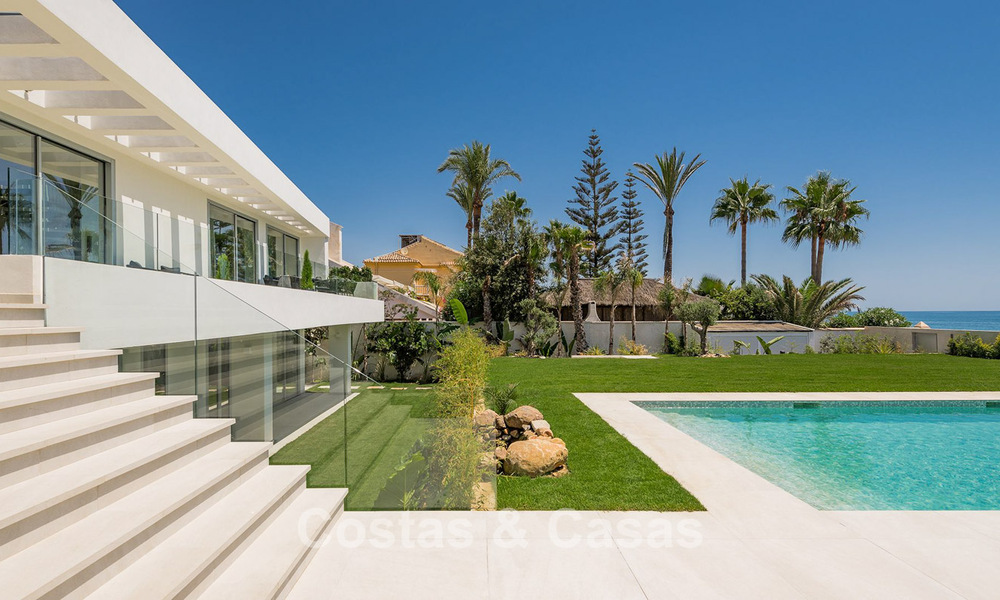 Exclusive, modern beachfront villa for sale with direct access to the beach in Mijas, Costa del Sol 797401