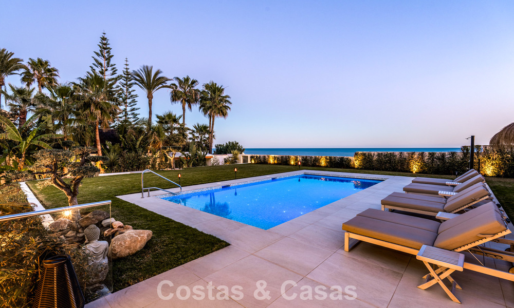 Exclusive, modern beachfront villa for sale with direct access to the beach in Mijas, Costa del Sol 797402