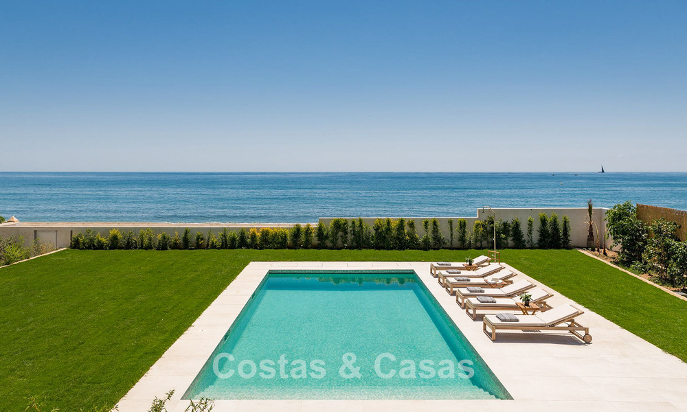 Exclusive, modern beachfront villa for sale with direct access to the beach in Mijas, Costa del Sol 797404