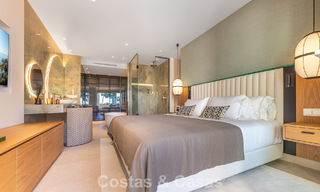 First-class apartment for sale with sea views in a beachfront complex on the New Golden Mile between Marbella and Estepona 797447 