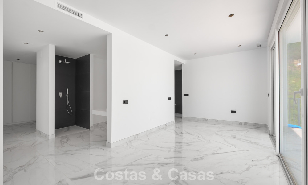 Brand-new modern villa with panoramic sea views for sale in a natural setting east of Marbella town centre 797623