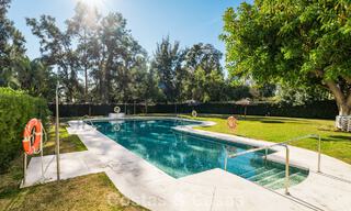 Stylish renovated garden apartment for sale on a prestigious golf course in La Quinta, Benahavís - Marbella 797942 