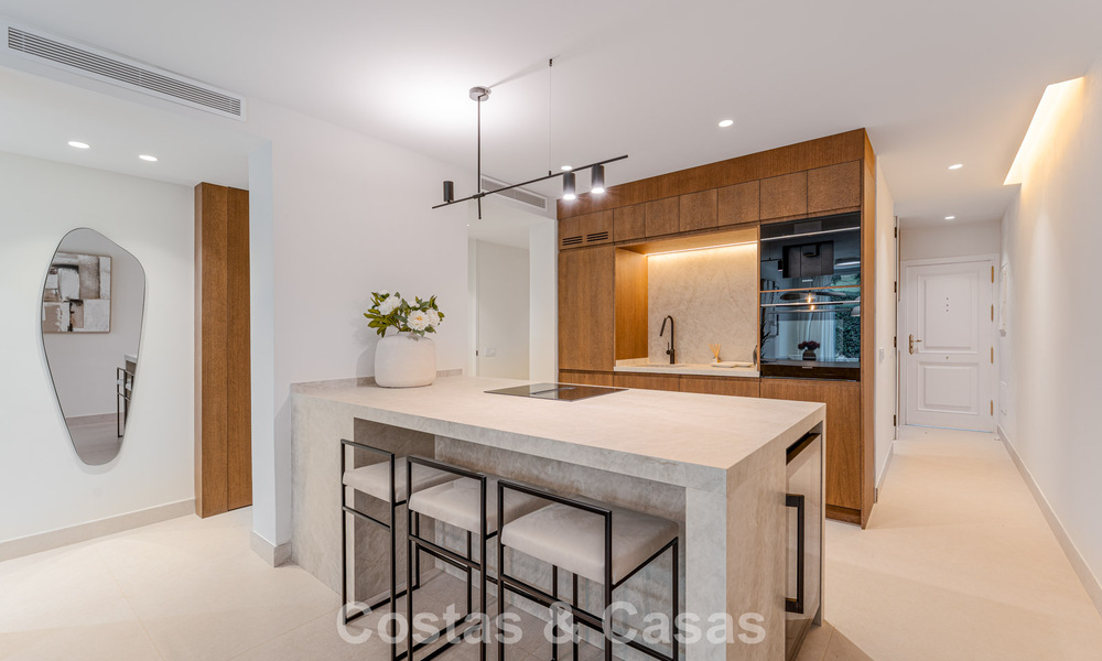 Stylish renovated garden apartment for sale on a prestigious golf course in La Quinta, Benahavís - Marbella 797943