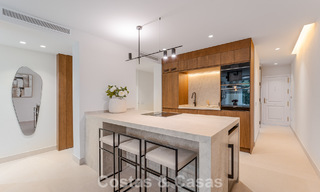 Stylish renovated garden apartment for sale on a prestigious golf course in La Quinta, Benahavís - Marbella 797943 