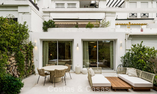 Stylish renovated garden apartment for sale on a prestigious golf course in La Quinta, Benahavís - Marbella 797945 