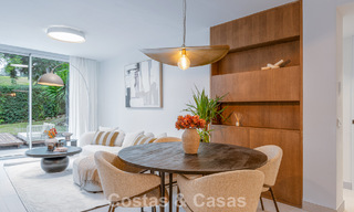 Stylish renovated garden apartment for sale on a prestigious golf course in La Quinta, Benahavís - Marbella 797946 