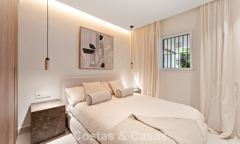 Stylish renovated garden apartment for sale on a prestigious golf course in La Quinta, Benahavís - Marbella 797949