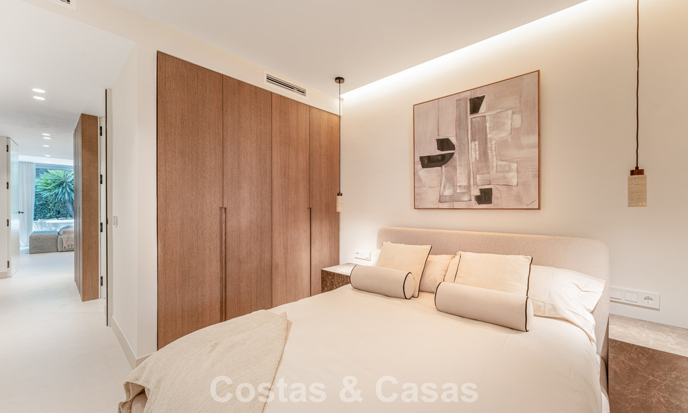 Stylish renovated garden apartment for sale on a prestigious golf course in La Quinta, Benahavís - Marbella 797950
