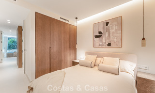 Stylish renovated garden apartment for sale on a prestigious golf course in La Quinta, Benahavís - Marbella 797950 
