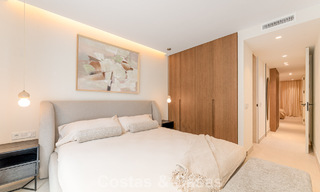 Stylish renovated garden apartment for sale on a prestigious golf course in La Quinta, Benahavís - Marbella 797953 