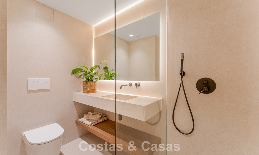 Stylish renovated garden apartment for sale on a prestigious golf course in La Quinta, Benahavís - Marbella 797955