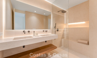 Stylish renovated garden apartment for sale on a prestigious golf course in La Quinta, Benahavís - Marbella 797956 