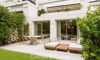 Stylish renovated garden apartment for sale on a prestigious golf course in La Quinta, Benahavís - Marbella 797962 