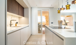 Spacious, modernised 4-bedroom apartment with sea views for sale in Nueva Andalucía, Marbella 798259 