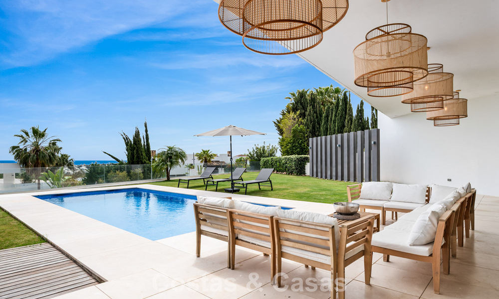 Contemporary modern villa with panoramic sea views for sale in a prestigious golf area in Marbella - Benahavís 798839