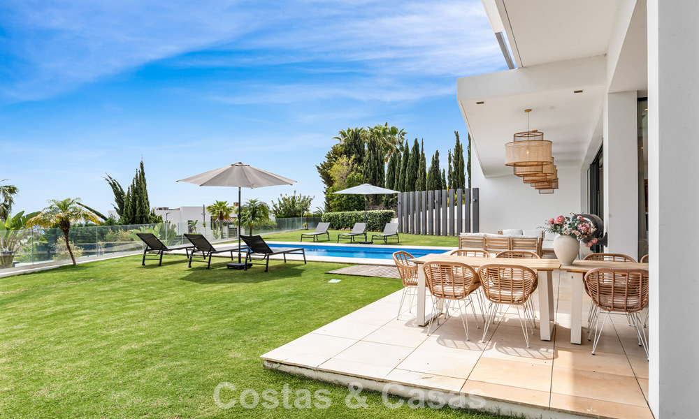 Contemporary modern villa with panoramic sea views for sale in a prestigious golf area in Marbella - Benahavís 798841