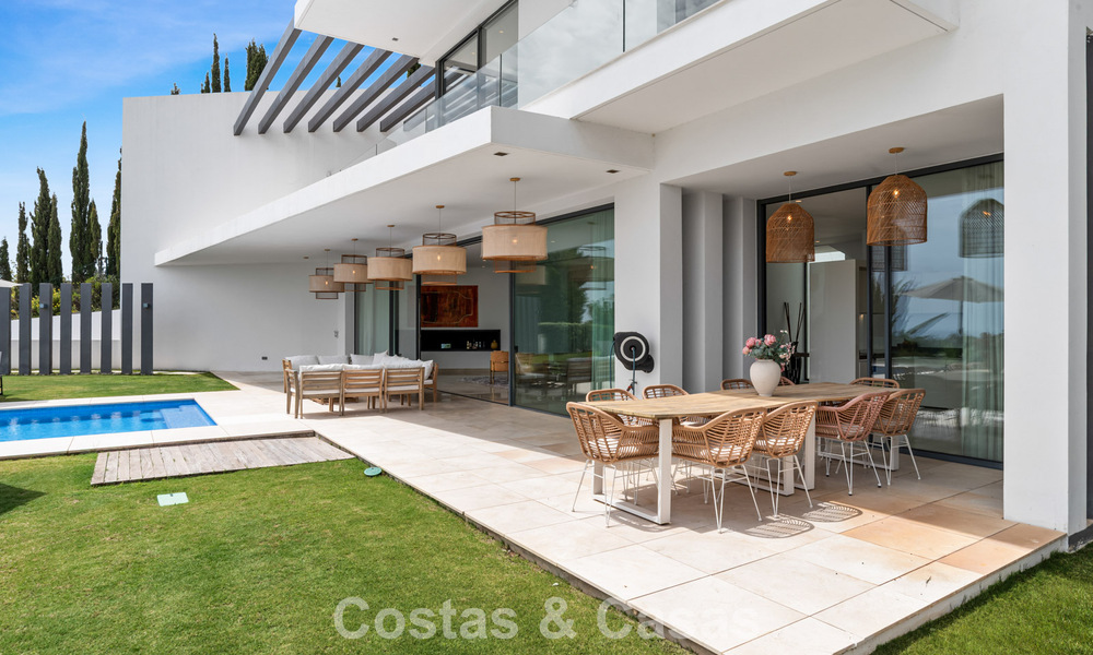 Contemporary modern villa with panoramic sea views for sale in a prestigious golf area in Marbella - Benahavís 798844