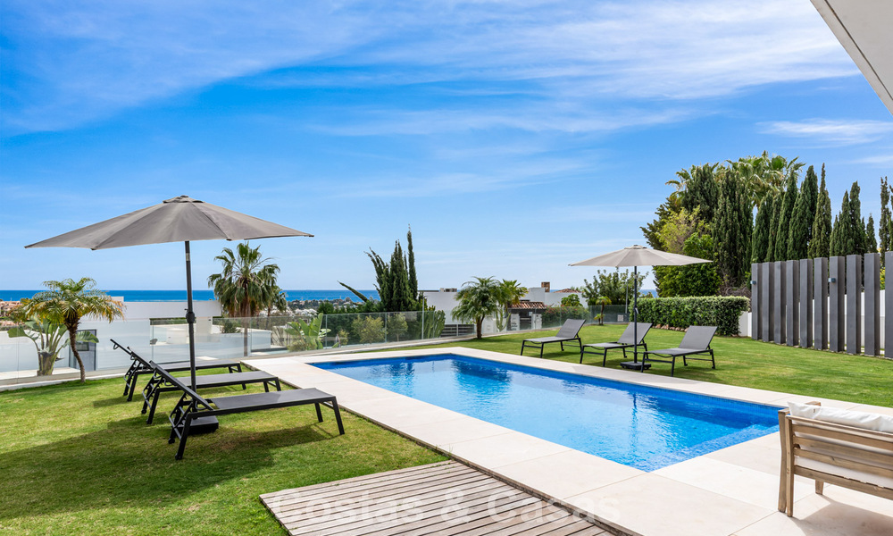 Contemporary modern villa with panoramic sea views for sale in a prestigious golf area in Marbella - Benahavís 798846