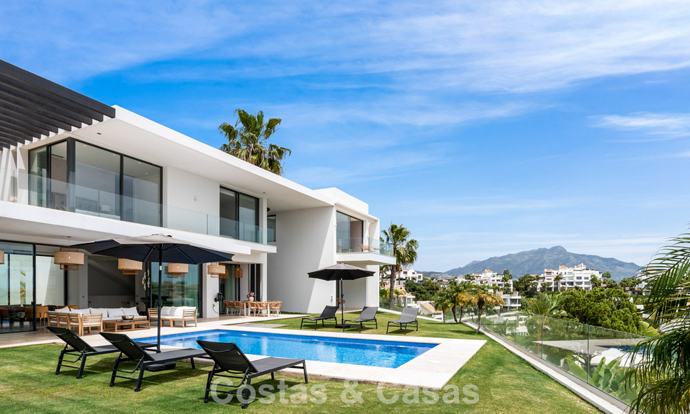 Contemporary modern villa with panoramic sea views for sale in a prestigious golf area in Marbella - Benahavís 798847